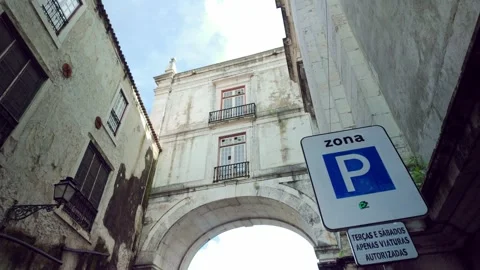 Elevated view of Lisbon rooftops under a cloudy sky Видео 332784106