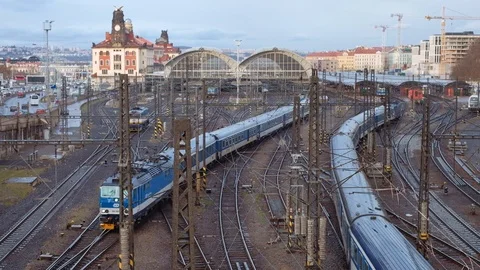 Elevated view of main railway station, railway tracks and trains passing by. Stock Footage 107013287