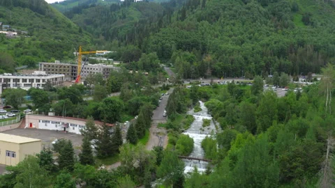 Elevated view of Medeo lush slopes from a cable car Video stock 318486431