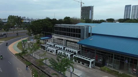 Elevated view of a modern industrial complex with extensive cooling infrast.. Stock Footage 339035519
