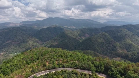 Elevated View of Mountain Forest and Highway Curve Stock Footage 329817912