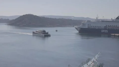 Elevated View from Oslo Opera House of Passenger Ferry and Cruise Ship Stock Footage 340960585