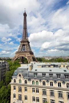 Elevated view over the city with the Eiffel Tower in the distance, Paris, Fotos Stock
