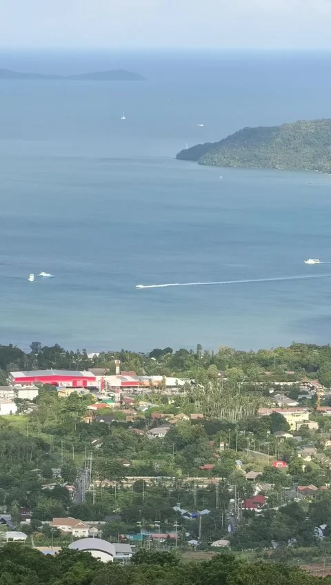 Elevated View Over Coastal Town Tropical Ocean Bay and Speedboat Stock Footage 341901300