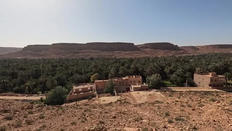 Elevated view over the date palm grove and plateau, Ziz Canyon, Errachidia, Stock Footage 344534376