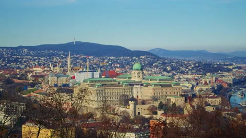 Elevated view overlooking Budapest city with dense buildings, river curves Stock Footage 326066049