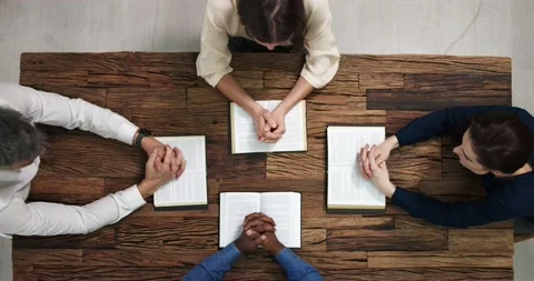 Elevated View Of People Reading Holy Books Stock Footage 230989928