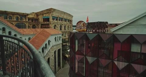 Elevated View of Phu Quoc Brew House and Pedestrian Street in Sunset Town Stock Footage 346852955