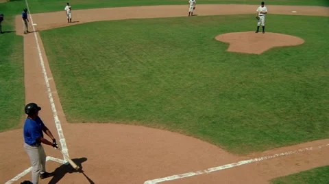 Elevated view of play at plate as runner steals home Stock Footage 59533833