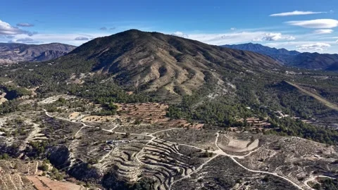 Elevated View Of Rugged Quarry Terrain. Aerial Image Capturing Erosion And Stock Footage 342399930