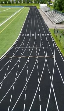 Elevated View of Running Track with Bleachers and Football Field Stock Photos