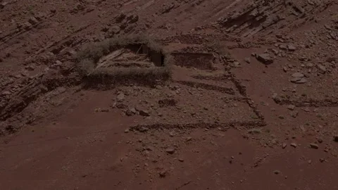 An elevated view shows an isolated primitive stone shepherd compound and Stock Footage 346106603