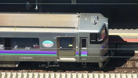 Elevated view of stationary Hakodate Liner train, Hakodate, Japan, 2026.09.10. Stock Footage 345363384