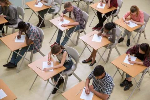 Elevated view of students writing their GCSE exam Stock Photos