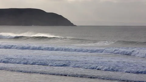 Elevated view of surf swell at Woolacombe in North Devon Stock Footage 142432829