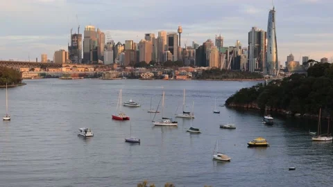 Elevated view of Sydney city CBD across Berrys bay near sunset – 4k. Stock Footage 137095840