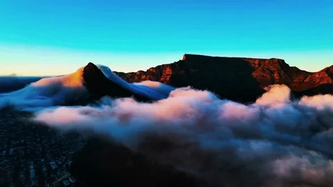 Elevated view of Table Mountain and Lion's Head peak partially covered by low Stock Footage 346262870