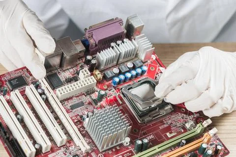 Elevated view technician working computer motherboard elevated view techni... 写真素材