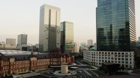 Elevated View of Tokyo Station with High-Rise Buildings late Afternoon Stock Footage 56139108
