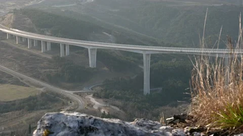 Elevated view of traffic on A1 highway and Crni Kal viaduct Stock Footage 150313945