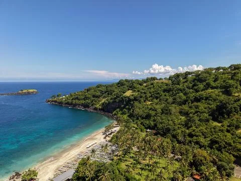 Elevated view of a tropical sandy beach with turquoise ocean water Photos