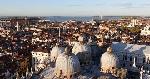 Elevated view of Venice with basilica domes and rooftops in Italy Stock Footage 128138587