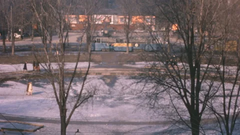 Elevated View Of Winter City Park With Bus And Tram In Stockholm Sweden 1960s Vídeos de archivo 346793782