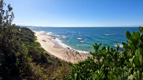 Elevated views of Shelly Beach and the Pacific Ocean from Captain Cook Look.. Stock Footage 282633491