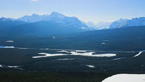 Elevated wilderness view in a Jasper style setting reveals expansive evergreen Stock Footage 334100042