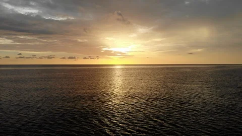 Elevating Aerial Flight over Impressive Sunset at the Sea Stock Footage 93716718