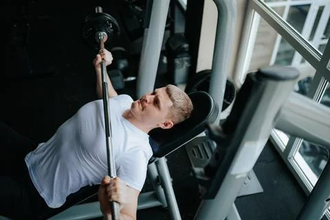 Elevating Performance Gym Workout with Barbell for Young Athletes Stock Photos