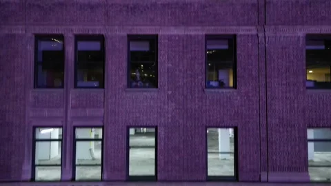 Elevating on a well lit building Stock Footage 246548452