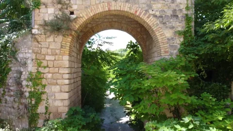 Elevation over the gate of Faraone Vecchio revealing the mountains, Abruzzo Stock Footage 136467901
