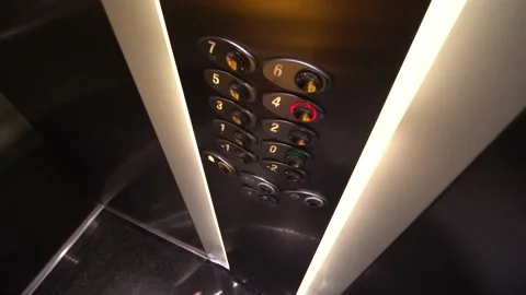 Elevator and presses button number 6 Stock Footage 181050942