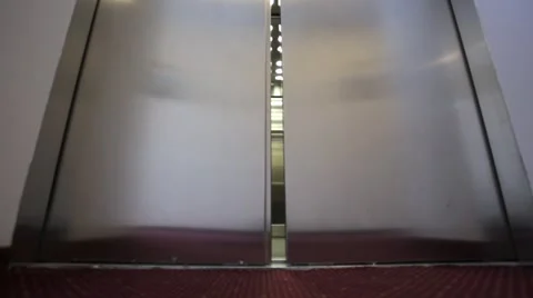 Elevator is arriving and doors open automatically. Close up Stock Footage 64885892