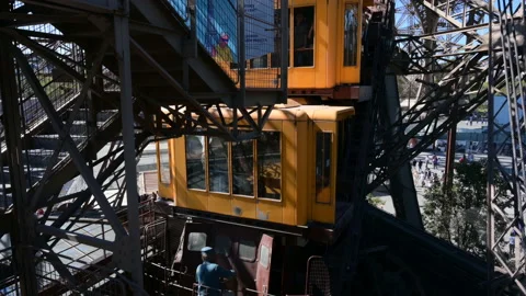 Elevator ascending the Eiffel tower in Paris, France Video stock 128232797