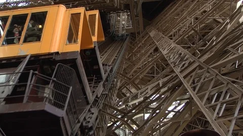 Elevator ascending to observation deck of Eiffel Tower in Paris, France Stock Footage 106779961