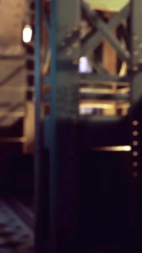 Elevator in a busy building with a mixture of light and shadows at night Vídeos de archivo 330162975