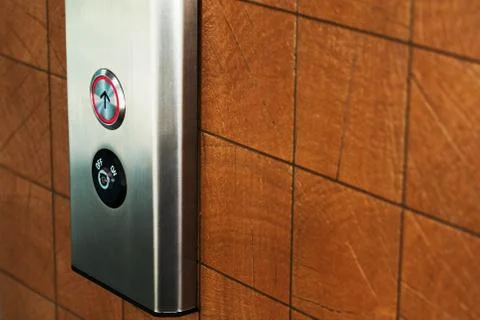Elevator button up and down direction Stock Photos