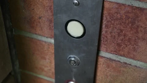 A Elevator Button in Brick Building Stock Footage 333075512