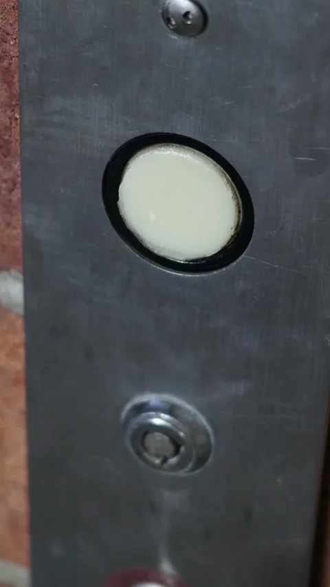 A Elevator Button in Brick Building - Vertical Stock Footage 333121170