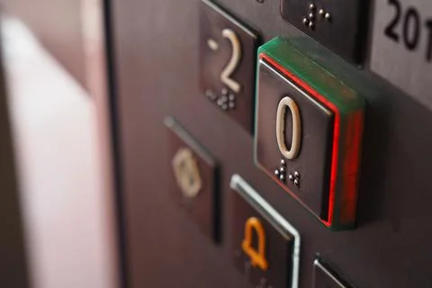 Elevator button in a building in a city Stock Photos