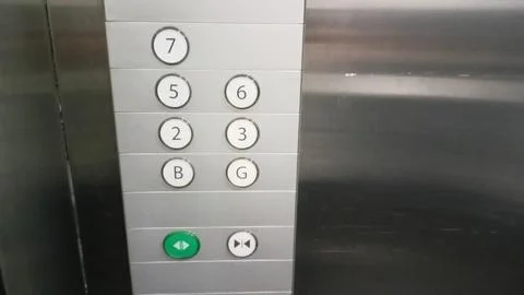 Elevator button that functions to move the elevator Stockfoto's