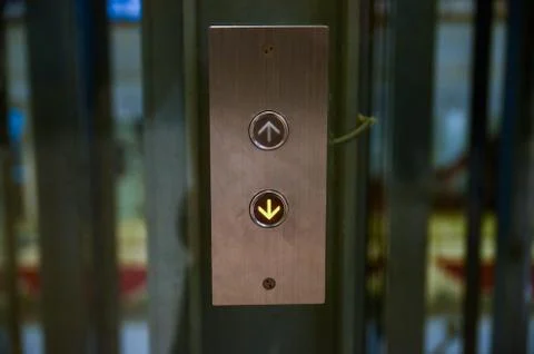 Elevator button to go up and down with arrows. Stock Photos