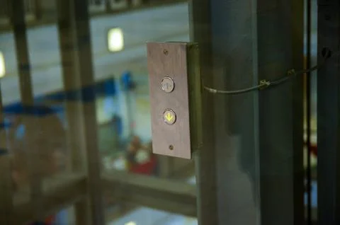 Elevator button to go up and down with arrows. Stock Photos