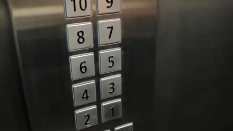 Elevator Button Pressed - Modern Control Panel with Illuminated Floor Selection Stock Footage 300946431