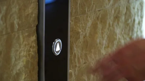 Elevator button on wall Stock Footage 310186982