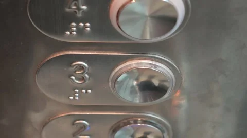 Elevator buttons lighting up in sequence 库存影片 315356572