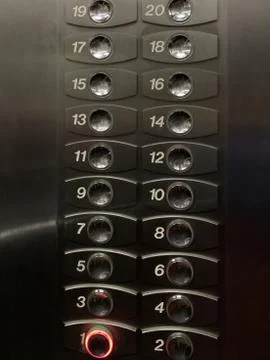 Elevator buttons in a multi-storey building. High-speed elevator control pane Stock Photos
