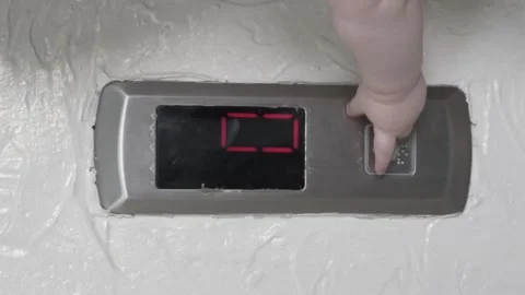 The elevator call button in the house on the wall Stock Footage 213664129